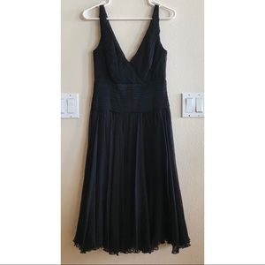 Beautiful black silk dress with v neck & pleated